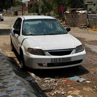 مازدا ٣٢٣ ٢٠٠٢  تةكسي كراوةتة خسوسي رةقةم و سةنةوي تازة 07504885581