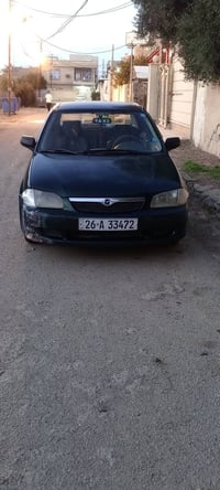 مازدا ٢٠٠٠ • كير عادي • داخل نضيف