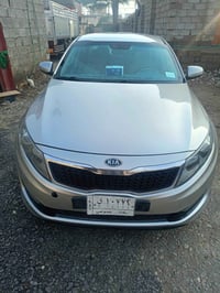 كيا اوبتيما البيع وارد امريكي      موديل 2012ماشيه140كيرمحرك خير من ال...