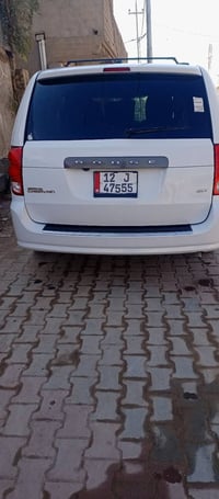 / دوج كرفان للبيع رقم نينوى اجره انكليزي سيار باسمي موديل 20 سياره مكف...
