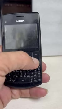 نوكيا X2 • كيبورد • حافة شاشة غيم