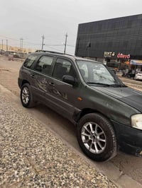 مازدا تربيوت 2003  السعر 35 مجال قليل   ‭0772 901 8953‬