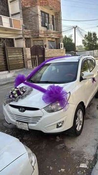 توسان ٢٠١١ خليجي مكفوله من الضربة لون ابيض رقم مميز بغداد بيها مكانات ...