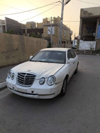 كيا اوبرس • ٢٠٠٦ • ترقيم بابل