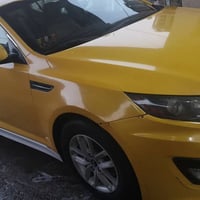 اوبتيما • ٢٠١١ • مكينة جديدة