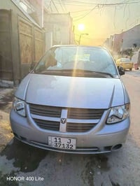 سيارة للبيع دوج كراند كرفان 2006 لون سيلفر فضي مصبوغه حزام ، 6 سلندر 3...