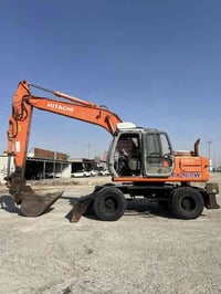 فيات هيتاشي • موديل ٢٠٠١ • ١٣٥٠٠ ساعة