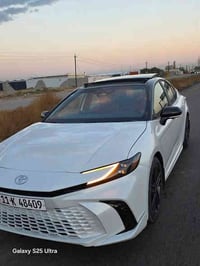 تويوتا كامري هايبرد موديل 2025 الشكل الجديد الصنف XSE رقم بغداد السيار...