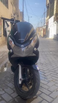 دراجه جيل الول 1250   مكان مدينه الصدر رقمي 07703721131