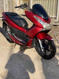 دراجه بي سي اكس ميه وخمسه وعشرين دراجه مكفوله مكينه ما مفتوحه. كهربائي...