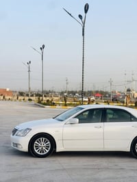 شاهانە ڕۆیاڵ • ٢٠٠٦ • أبيض