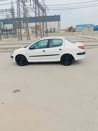 بيجو 206رقم بغداد  موديل 9  سعر 43 07727169357