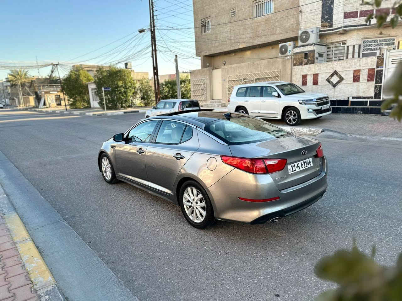 السلام عليكم *********** للبيع كيه اوبتيما وارد أمريكي موديل 2015 السعر (123) بدون حادث دعاميه فقط بدون تبديل صور الحادث  بلمنشور سياره كله ليبل واحد جاملغ وبنيد بيهن مرشوش كلير سبب جراد مواصفات السياره فول 1/1 بصمه بنراما تبريد قطعتين كشنات جلد+كهربائي+ ذاكره+ تدفئه بلكشنات سماعات انفنتي داخل صاج شاشه كبيره كامرا خلفيه تحكم ستيرن جهتين أشاير بلمري ويل كب مثبت سرعه مكينه 2400 اربعه دسك مكينه وكير وتخم تايرات بحاله ممتازه جدا جدا تحويل مباشر رقم بغداد انكليزي مكان سياره في كربلاء
