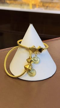 زوج ملاوي • إماراتي • ٣٥٫٣٤غ