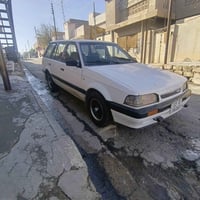 مازدا ٣٢٣ • بنزين • رقم جديد