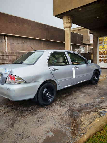 لانسر موديل 2010 خليجي بيهة  باب السائق ولباب خلف السائق مصبوغات كلير وخشم الجاملغ الخلفي طخة بسيطة عالبارد  شرط بدون  معجون و الباقي كفالة عامة شرط السونار مكينة 2000 شادهة جديد مال حاوية گير مكفول تبريد ثلج تخم تاير جديد صدر جديد السيارة ماا ناقصهة اي شي گبل للشارع ماتصرف عليهة ربع ترايك للبصرة 
معروضة ب 85 وبيهة مجال 
مكان السيارة بغداد. تقاطع النهروان مكلف بالنشر للاستفسار 
***********
