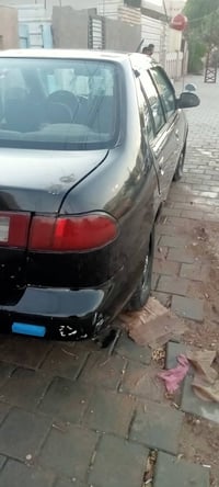 للبيع نيسان سني مديل 98 رقم بغداد إنكليزي بسمي 29سنويه فتحه سقف سياره ...