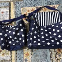 حقيبة أطفال • ملابس أطفال • حفاضات