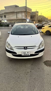 بيجو موديل 2004سياره نظيفه تخم تاير مكينه كير حداديه  رقم بغداد مباشر ...