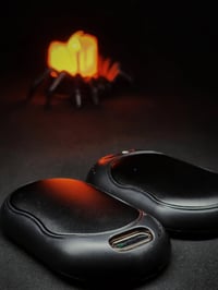 جهاز تدفئة اليدين القابل لإعادة الشحن (Model C308)، وهو عبارة عن زوج م...