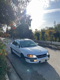 اوميگه بزون • ١٩٩٥ • رقم اربيل مميز