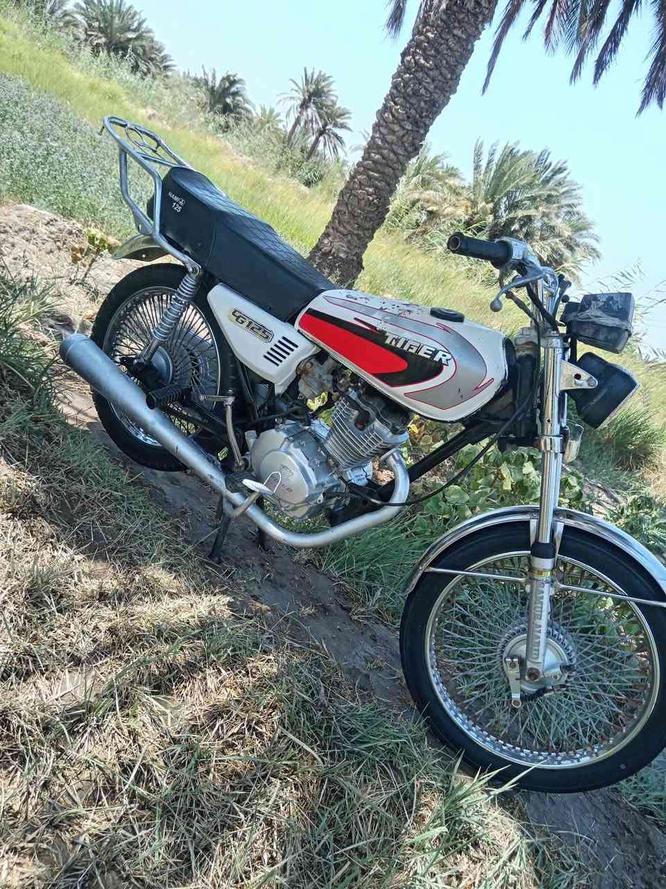 دراجه للبيع تايكر مديل 21اوراق سكنر محرك ما مفتوح مكاني الوركاء ناحيت الكرامه ***********
