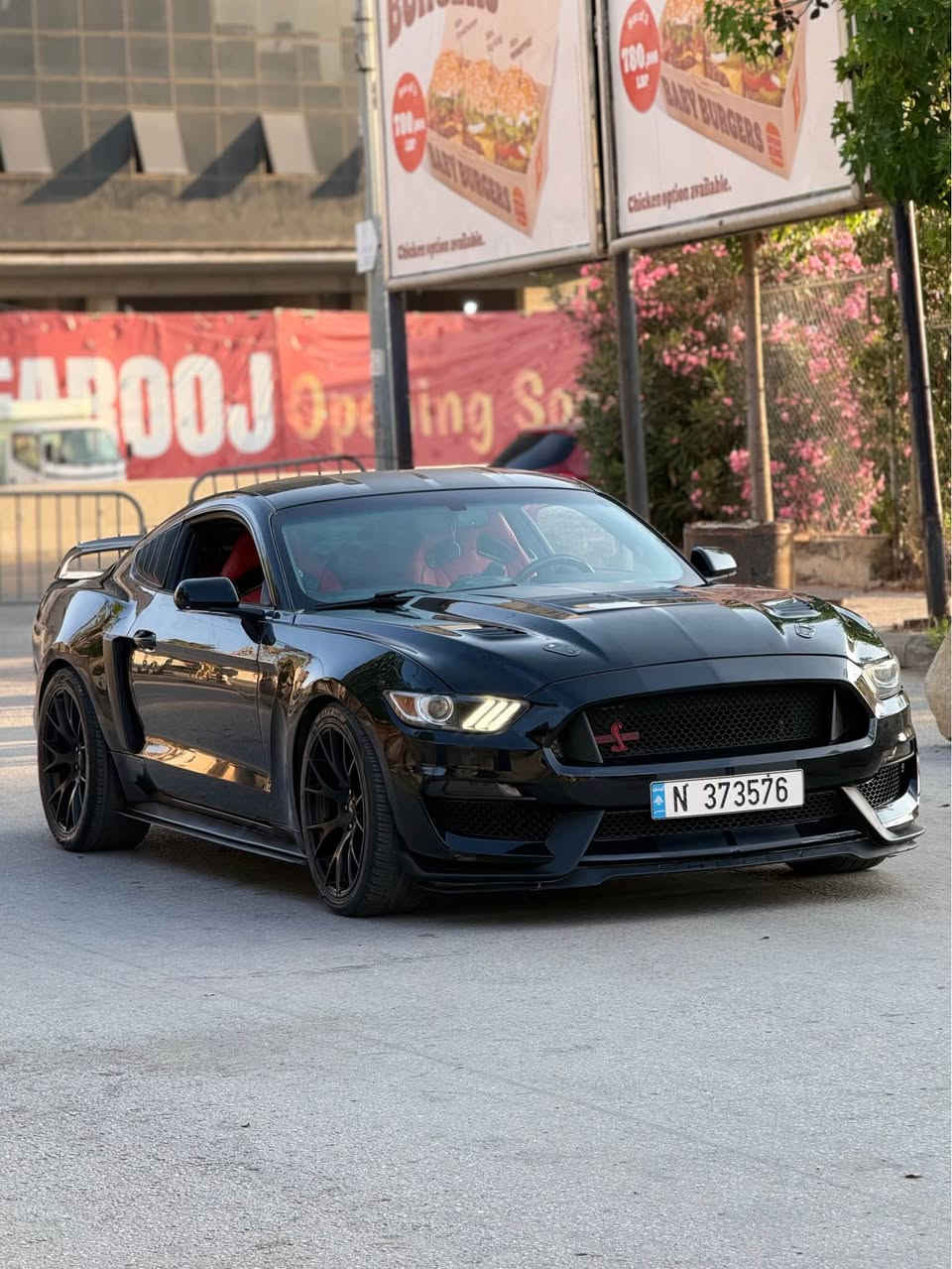 FORD MUSTANG GT 5.0 🐎🚀
MODEL 2015 🔥
UAE SOURCE 🇦🇪
79,000 KM ONLYY 🔥 
BLACK 🖤/ RED ❤️
5.0L COYOTE V8🔥🚀
REAR WHEEL DRIVE 🔥
AROUND 470 HORSE POWER 🐎 

🔥 Exterior (GT350 Full Conversion Style)‼️
• Shelby GT350 front bumper🔥
• Shelby GT350 track pack hood🔥
• Shelby GT350 fenders🔥
• Shelby GT350 rear bumper & diffuser🔥
• Shelby GT350 R rear spoiler🔥
• MMD rear & side louvers🔥
• Raxiom rear 4th brake light🔥
• Raxiom side markers🔥
• Euro style LED tail lights🔥
• 20” performance wheels + tires🔥

Interior Upgrades‼️🔥
• Full carbon fiber interior trim🔥
• Ford limited edition Recaro seats🔥
• Carbon fiber racing steering wheel🔥
• Paddle shifter extensions🔥
• 10” Tesla-style touchscreen🔥

Performance Upgrades‼️🔥
• JLT cold air intake🔥
• Stainless Works long tube headers🔥
• Full Roush exhaust system (quad tips)🔥
• Palm Beach dyno tune🔥
• ECU optimized setup🔥
PRICE:18,500$🔥🔥
📞81/615/449📞
Mwjude beirut ein lromene الشياح, بعبدا


**إذا كنت صاحب هذا الإعلان وتريد حذفه لأي سبب، رجاءا أرسل رسالة إلى الدعم الفني**