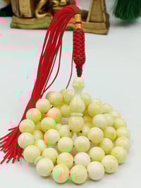 خرز كهرب • ١٠ملم • ٥٧خرزة