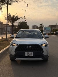 كورولا كروس • ماشية ١٥ الف • داخلي احمر