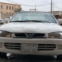 بروتون • ٢٠٠٤ • گير اوتماتيك