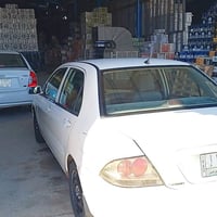 لانسر ٢٠١٠ للبيع مكينة ٢٠٠٠ بيها ضربة بالجنطة والبدنه الاماميه ما واصل...