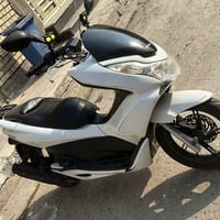 pcxجيل الاول ياباني حجم المكينة 125 دراجة نظيفه خير من الله بس دهن وبا...