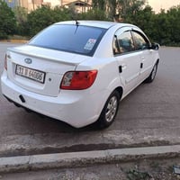 كيا ريو 2011 مواصفات برايد داخل اسود وتحكم استيرن أربع جامات كهرب كير ...