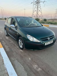 للبيع بيجو 307 موديل 2005 رقم بغداد انكليزي تحويل ثاني يوم  السياره مك...