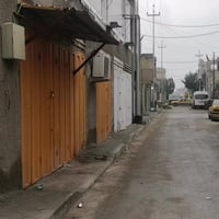 ١٠٠م • ٤ محلات وشقة • طابو زراعي