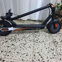 سكوتر جديد غير مستخدم ضمان بطاريه ست شهور تاير نفخ بلوتوث مع برنامج لل...