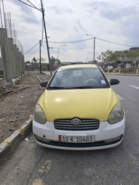 اكسنت دبدوب 2009كوري رقم بغداد دولي محرك شرط كير شرط  هيئه مصفره  الضر...