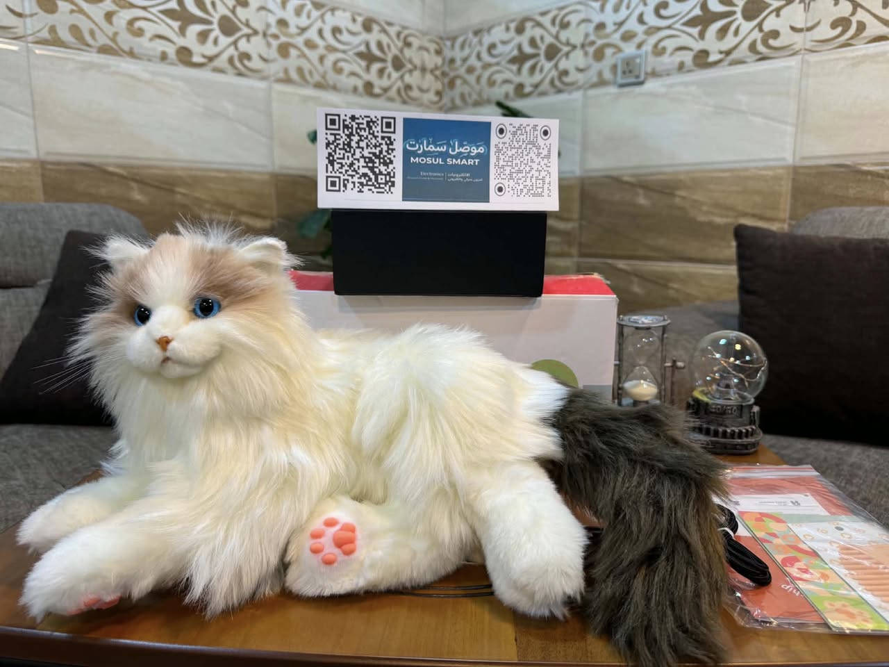 السلام عليكم
مجسم قطة 🐈 مقارب للحقيقي تفاعلي شحن تايب سي جديد ما مستخدم 
قيم وبالعافية 🌹
وهذا شرح 
هذه لعبة قطة تفاعلية نابضة بالحياة من شركة Elephant Robotics، وتحديدًا طراز MetaCat Ragdoll.الميزات التفاعلية: تم تصميم الروبوت ليحاكي سلوك القطط الحقيقية، بما في ذلك الخرخرة، وهز الذيل، وحركات العين، والقدرة على الاستجابة لـ 20 أمرًا صوتيًا مختلفًا.مستشعرات اللمس: يحتوي على مستشعرات مدمجة في الرأس والذقن والظهر، مما يسمح له بالاستجابة للمساتك بمواء واقعية وحركات تفاعلية.التصميم والمواد: مصنوع من فرو صناعي ناعم وعالي الجودة، مما يجعله آمنًا ومريحًا، وهو مناسب كرفيق للأطفال والكبار وكبار السن، خاصة أولئك الذين يعانون من حساسية تجاه الحيوانات الحقيقية.


**إذا كنت صاحب هذا الإعلان وتريد حذفه لأي سبب، رجاءا أرسل رسالة إلى الدعم الفني**