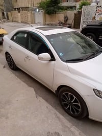 كيه سيراتو موديل 2012 كير محرك نضيف جدا بسمي سعر 75 وتصال 07737018532