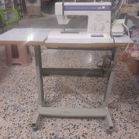مكينة خياطة • نجف • مع الميز