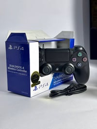 يد تحكم لاسلكية PS4 DualShock 4  مع ضمان لمدة سنة  استمتع بتجربة لعب م...