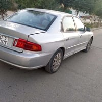 كيا اوبتيما موديل 2001 بسمي محرك وكير اوتو مكفولات السعر 48 مكان بغداد...