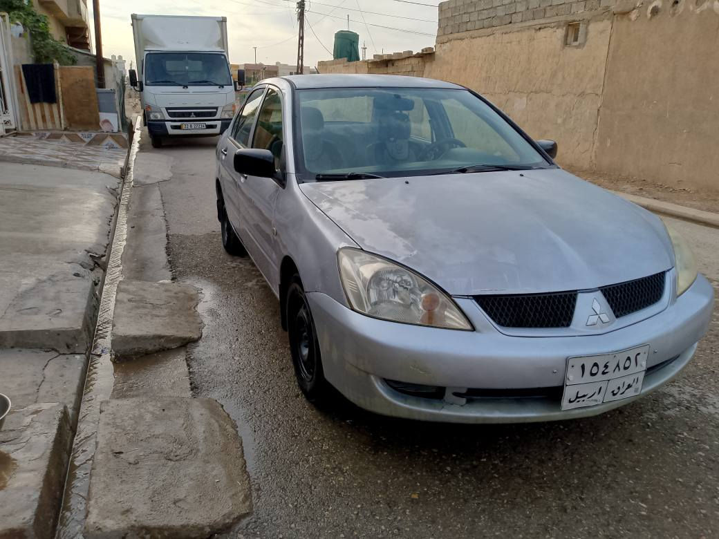 لانسەر مۆدیل 2008بێ بۆیاخ تەنها کەمێک کال بونەوەی هەیە گێرعادی مەکینەی کراوە بەگەورە  نرخی 70وەرەقەو کەمێک معامەلە سەنەوی تازەبەسەرچوە *********** اكر, نينوى
