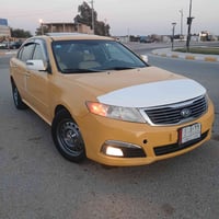 اوبتيما 2009 • مكينة 2400 • وارد امريكي