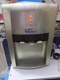 براد ماء • بارد وساخن • ثنينها شغّالين