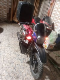 دراجه بوكسر للبيع مكينه ايراني دخن اوراق ومكمركه كامله سعرها 400الف قف...