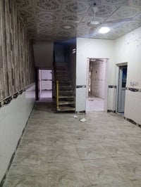 النجف حي ميسان • دار 100م • طابقين