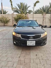 كيا لوتز موديل 2009 جاهزه بيها شبر صبغ بالباب الخلف الصدر للبيع فقط 07...