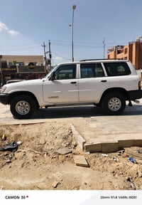 نيسان باترول 2002 رقم انگليزي  السيارة  گير ومحرك حيل نظيف لاصرف ولاتب...