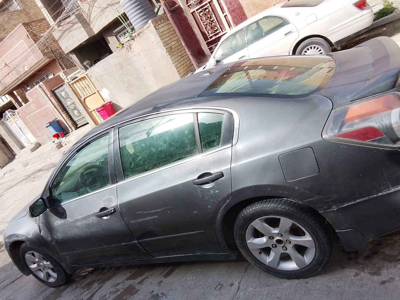 نيسان التيما 2009 رقم صلاح الدين لون جارد بيها طخطخات ضربتها من دعاميه ورة وجاملغ محرك مكفول سعر ٥٧ وبيها مجال مكاني بغداد الشعب 
***********
